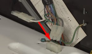 Disconnect the lid switch wire connector.
